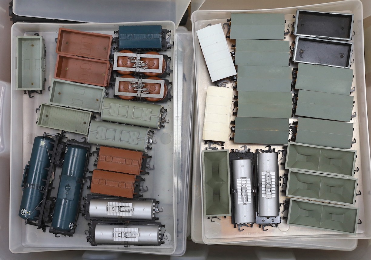 A large quantity of Hornby Dublo carriages, wagons and other rolling stock, much with original boxes, much unboxed, spare boxes which may well match, 5 boxes